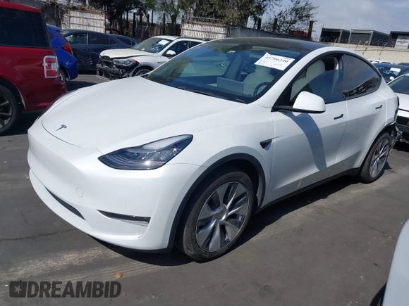 2021 Tesla Model Y Long Range with VIN 5YJYGDEE3MF081304, listed as a IAAI auction lot 41706240 with 90,510 mi miles and . Bid and sale history available at DreamBid. Image 19.