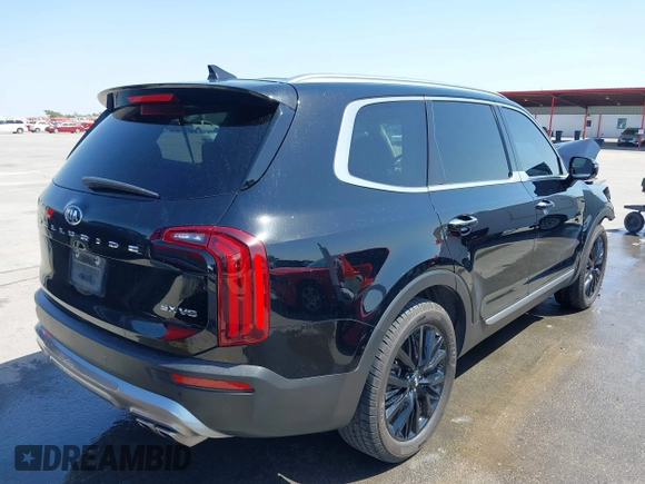 2020 Kia Telluride SX with VIN 5XYP54HC8LG075209, listed as a IAAI auction lot 42000202 with 107,590 mi miles and . Bid and sale history available at DreamBid. Image 4.
