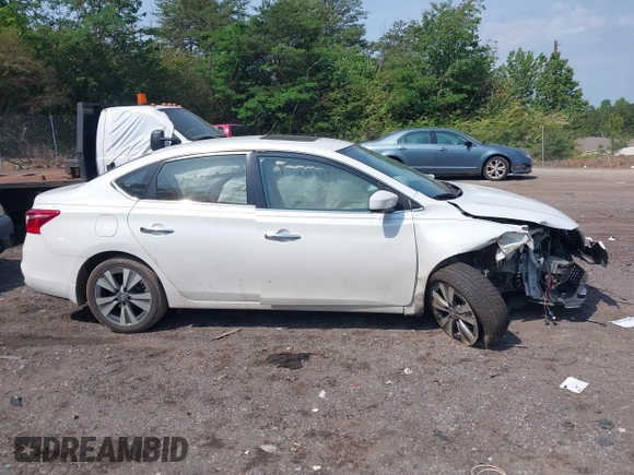 2019 Nissan Sentra S z VIN 3N1AB7AP8KY302151, wystawiony jako IAAI lot #42150965 z przebiegiem 138 486 mil mil oraz . Historia ofert i sprzedaży dostępna na DreamBid. Obrazek 12.