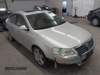 2009 Volkswagen Passat Komfort z VIN WVWJK73C69E005443, wystawiony jako IAAI lot #41614233 z przebiegiem 151 144 mil mil oraz . Historia ofert i sprzedaży dostępna na DreamBid. Obrazek 1.