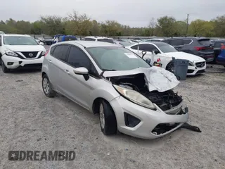 2013 Ford Fiesta SE with VIN 3FADP4EJ6DM107293, listed as a IAAI auction lot 41898229 with 129,694 mi miles. Bid and sale history available at carsss.com. Image 1.