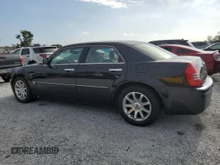 2005 Chrysler 300 C with VIN 2C3AA63H15H525775, listed as a Copart auction lot 52018135 with 59,098 mi miles and Salvage Title. Bid and sale history available at DreamBid. Image 2.