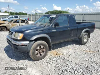 1999 Nissan Frontier XE with VIN 1N6ED26Y1XC337432, listed as a Copart auction lot 59865305 with 226,236 mi miles and Salvage title. Bid and sale history available at DreamBid. Image 1.