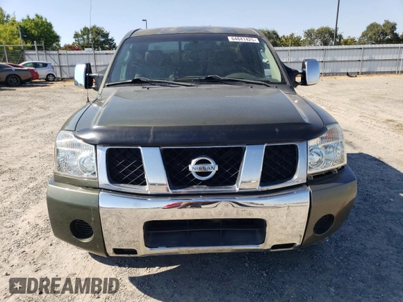 2005 Nissan Titan SE z VIN 1N6AA06B85N507424, wystawiony jako Copart lot #64841425 z przebiegiem 208 542 mil mil oraz Czysty tytuł • Clean title. Historia ofert i sprzedaży dostępna na DreamBid. Obrazek 5.