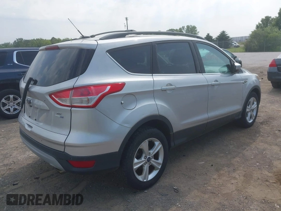 2014 Ford Escape SE z VIN 1FMCU9GX3EUB83978, wystawiony jako IAAI lot #42509549 z przebiegiem 121 388 mil mil oraz . Historia ofert i sprzedaży dostępna na DreamBid. Obrazek 4.