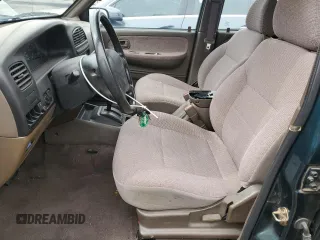 1999 Kia Sportage with VIN KNDJB7232X5612065, listed as a Copart auction lot 47575445 with 77,486 mi miles and Clean Title. Bid and sale history available at carsss.com. Image 7.