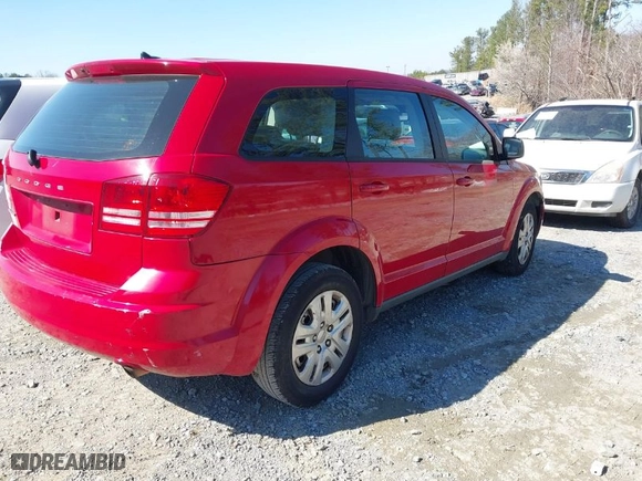 2013 Dodge Journey SE with VIN 3C4PDCAB2DT671487, listed as a IAAI auction lot 41784158 with 290,228 mi miles. Bid and sale history available at carsss.com. Image 4.