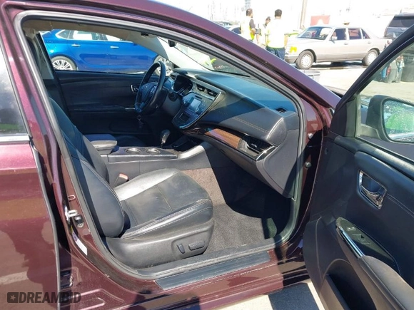 2014 Toyota Avalon Hybrid Limited with VIN 4T1BD1EB1EU018886, listed as a IAAI auction lot 41651673 with 137,890 mi miles. Bid and sale history available at carsss.com. Image 5.