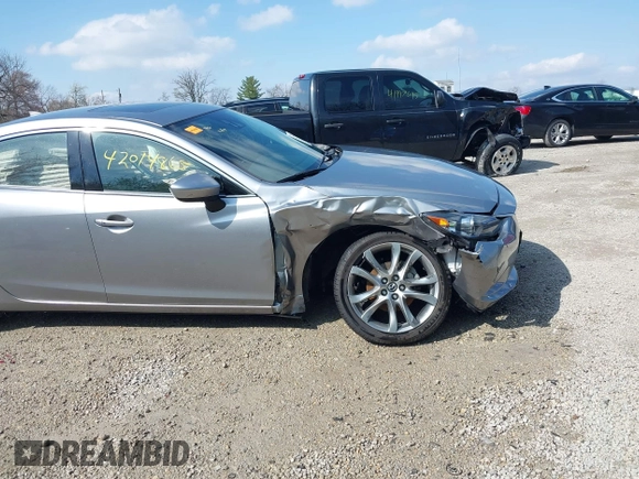 2015 Mazda 6 i Grand Touring with VIN JM1GJ1W52F1195333, listed as a IAAI auction lot 42014865 with 107,039 mi miles and . Bid and sale history available at DreamBid. Image 6.