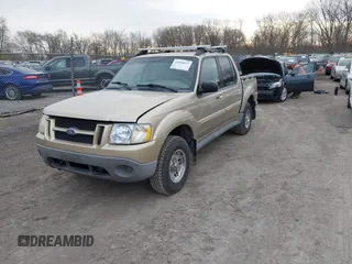 2001 Ford Explorer Sport Trac z VIN 1FMZU77E71UB38985, wystawiony jako IAAI lot #41950927 z przebiegiem 283 235 mil mil oraz . Historia ofert i sprzedaży dostępna na DreamBid. Obrazek 2.