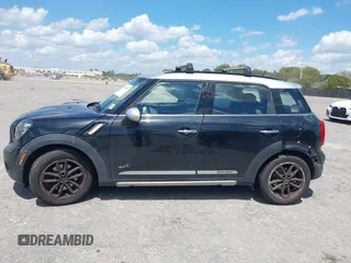 2016 MINI Countryman S z VIN WMWZC5C58GWU21536, wystawiony jako IAAI lot #41907958 z przebiegiem 83 761 mil mil oraz . Historia ofert i sprzedaży dostępna na DreamBid. Obrazek 13.