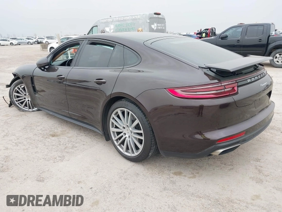 2019 Porsche Panamera with VIN WP0AA2A76KL100288, listed as a IAAI auction lot 41741039 with 76,834 mi miles and . Bid and sale history available at DreamBid. Image 3.