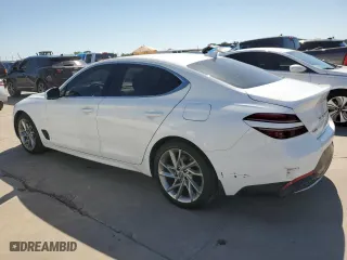 2022 Genesis G70 2.0T with VIN KMTG34TA2NU089573, listed as a Copart auction lot 51828944 with 34,543 mi miles and Salvage Title. Bid and sale history available at carsss.com. Image 2.