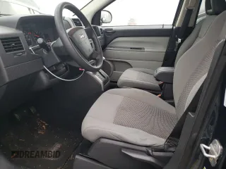 2007 Jeep Compass Sport with VIN 1J8FT470X7D261453, listed as a Copart auction lot 81710234 with 174,118 mi miles and Salvage Title. Bid and sale history available at carsss.com. Image 7.