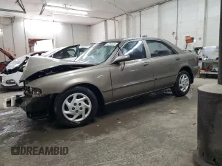 2000 Mazda 626 LX with VIN 1YVGF22C6Y5175233, listed as a Copart auction lot 42783225 with 167,704 mi miles and Salvage Title. Bid and sale history available at carsss.com. Image 1.