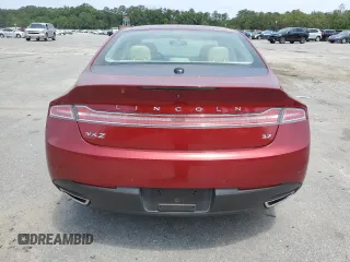 2014 Lincoln MKZ z VIN 3LN6L2GK4ER825465, wystawiony jako Copart lot #55911345 z przebiegiem 78 783 mil mil oraz Szkoda całkowita • Salvage title. Historia ofert i sprzedaży dostępna na DreamBid. Obrazek 6.