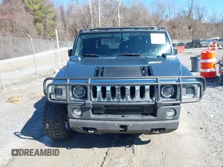 2005 Hummer H2 SUT with VIN 5GRGN22U85H107090, listed as a IAAI auction lot 41514241 with 202,119 mi miles. Bid and sale history available at carsss.com. Image 13.
