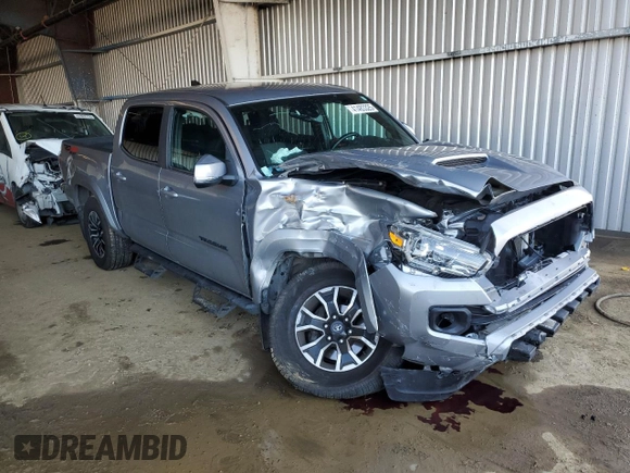 2021 Toyota Tacoma SR with VIN 3TMCZ5AN6MM393306, listed as a Copart auction lot 41483325 with 57,217 mi miles and Salvage title. Bid and sale history available at DreamBid. Image 4.
