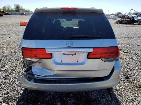 2010 Honda Odyssey EX-L with VIN 5FNRL3H76AB114542, listed as a Copart auction lot 54785425 with 104,239 mi miles and Salvage Title. Bid and sale history available at DreamBid. Image 6.