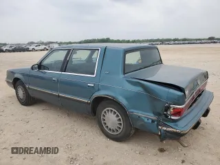 1993 Dodge Dynasty LE z VIN 1B3XC56R3PD124521, wystawiony jako Copart lot #51825725 z przebiegiem 94 336 mil mil oraz Szkoda całkowita • Salvage title. Historia ofert i sprzedaży dostępna na DreamBid. Obrazek 2.