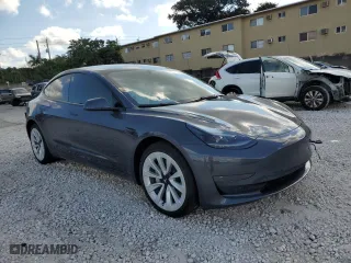 2023 Tesla Model 3 with VIN 5YJ3E1EA8PF552850, listed as a Copart auction lot 43792015 with 0 mi miles and Salvage Title. Bid and sale history available at carsss.com. Image 4.