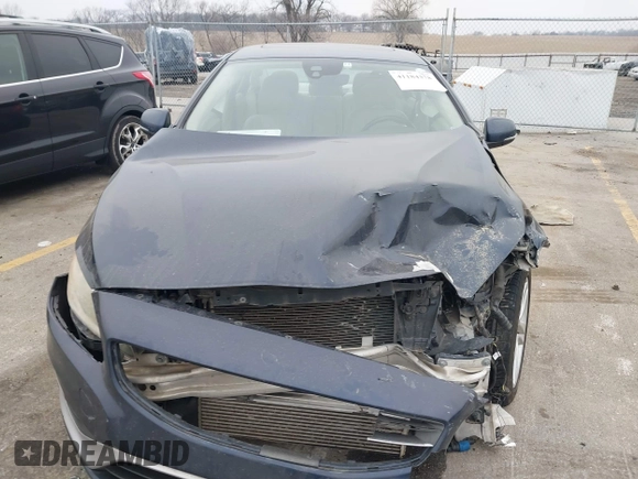 2015 Volvo S60 T5 Drive-E Premier z VIN YV126MFK1F2336786, wystawiony jako IAAI lot #41184378 z przebiegiem 134 482 mil mil oraz . Historia ofert i sprzedaży dostępna na DreamBid. Obrazek 12.