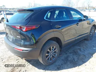 2021 Mazda CX-30 S with VIN 3MVDMAALXMM269676, listed as a IAAI auction lot 41581451 with 33,449 mi miles and . Bid and sale history available at DreamBid. Image 4.