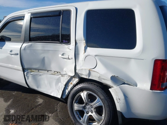 2013 Honda Pilot EX-L with VIN 5FNYF3H5XDB030830, listed as a IAAI auction lot 41079628 with 144,233 mi miles and . Bid and sale history available at DreamBid. Image 6.