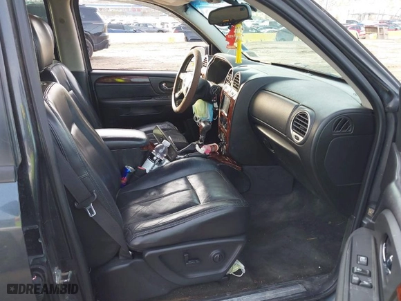 2005 GMC Envoy XL SLT with VIN 1GKET16M156142931, listed as a IAAI auction lot 41584914 with 215,452 mi miles. Bid and sale history available at carsss.com. Image 5.