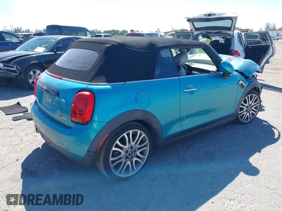 2016 MINI Convertible z VIN WMWWG5C5XG3A83276, wystawiony jako IAAI lot #41864830 z przebiegiem 103 721 mil mil oraz . Historia ofert i sprzedaży dostępna na DreamBid. Obrazek 4.