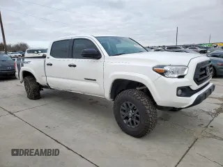 2022 Toyota Tacoma SR5 with VIN 3TMBZ5DN6NM035681, listed as a Copart auction lot 46226415 with 27,891 mi miles and Salvage title. Bid and sale history available at DreamBid. Image 4.