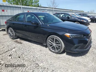 2023 Honda Civic Sedan Touring with VIN 2HGFE1F98PH323825, listed as a Copart auction lot 54216025 with 1,616 mi miles and Salvage Title. Bid and sale history available at carsss.com. Image 4.