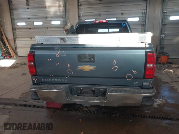 2014 Chevrolet Silverado 1500 LT with VIN 1GCVKREC0EZ130211, listed as a IAAI auction lot 41601900 with 209,604 mi miles and . Bid and sale history available at DreamBid. Image 17.
