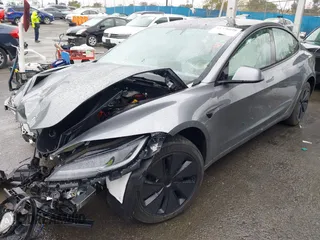 2025 Tesla Model 3 Long Range with VIN 5YJ3E1EA2SF885408, listed as a IAAI auction lot 41778498 with 1,566 mi miles and . Bid and sale history available at DreamBid. Image 23.