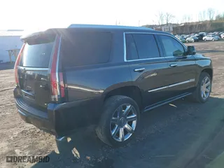2018 Cadillac Escalade Premium Luxury with VIN 1GYS4CKJXJR217809, listed as a IAAI auction lot 41711281 with 63,482 mi miles. Bid and sale history available at carsss.com. Image 4.