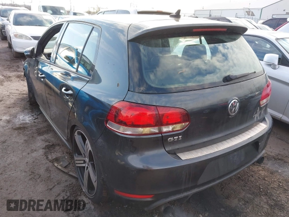 2010 Volkswagen GTI with VIN WVWHV7AJ5AW086277, listed as a IAAI auction lot 41753354 with 192,788 mi miles. Bid and sale history available at carsss.com. Image 3.
