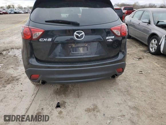 2016 Mazda CX-5 Touring z VIN JM3KE2CY0G0846699, wystawiony jako Copart lot #81785864 z przebiegiem 140 750 mil mil oraz Szkoda całkowita • Salvage title. Historia ofert i sprzedaży dostępna na DreamBid. Obrazek 6.
