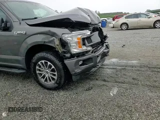 2019 Ford F-150 XL z VIN 1FTEW1EP2KFA58384, wystawiony jako Copart lot #56124665 z przebiegiem 105 493 mil mil oraz Szkoda całkowita • Salvage title. Historia ofert i sprzedaży dostępna na DreamBid. Obrazek 14.