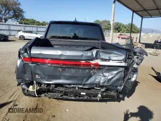 2024 Rivian R1T Adventure with VIN 7FCTGBAA1RN032543, listed as a Copart auction lot 69800484 with Not Provided miles and Salvage Title. Bid and sale history available at carsss.com. Image 6.