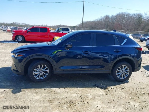 2022 Mazda CX-5 2.5 S Carbon Edition with VIN JM3KFBCM4N0634699, listed as a IAAI auction lot 41591253 with NaN miles. Bid and sale history available at carsss.com. Image 14.
