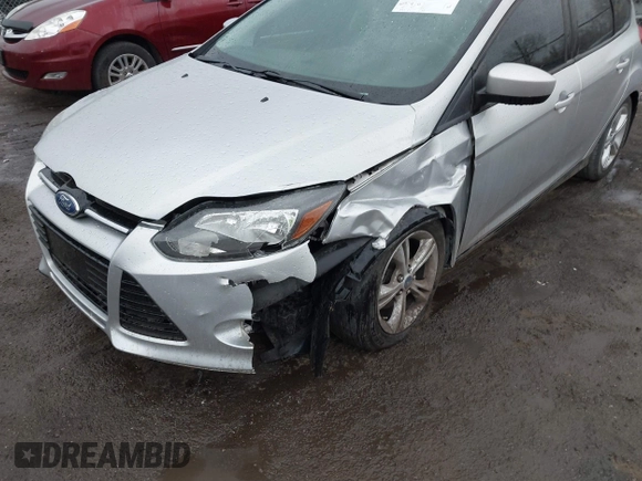 2012 Ford Focus SE z VIN 1FAHP3K27CL152803, wystawiony jako IAAI lot #42058556 z przebiegiem 181 717 mil mil oraz . Historia ofert i sprzedaży dostępna na DreamBid. Obrazek 6.
