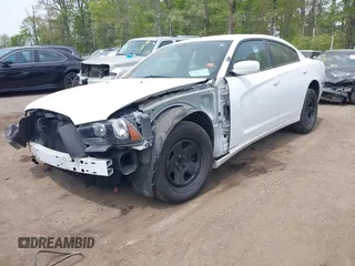 2014 Dodge Charger Police with VIN 2C3CDXAT8EH216267, listed as a IAAI auction lot 42104131 with 116,299 mi miles and . Bid and sale history available at DreamBid. Image 2.
