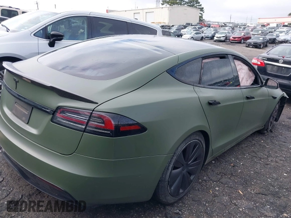2022 Tesla Model S with VIN 5YJSA1E50NF487306, listed as a IAAI auction lot 41570528 with Not Provided miles and . Bid and sale history available at DreamBid. Image 4.