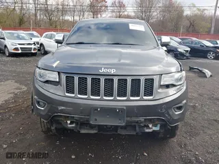 2014 Jeep Grand Cherokee Overland with VIN 1C4RJFCG5EC329377, listed as a IAAI auction lot 40822324 with 106,222 mi miles. Bid and sale history available at carsss.com. Image 13.