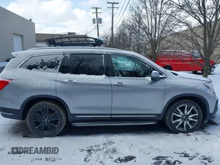 2021 Honda Pilot Elite with VIN 5FNYF6H02MB034165, listed as a IAAI auction lot 41365342 with 48,815 mi miles. Bid and sale history available at carsss.com. Image 13.