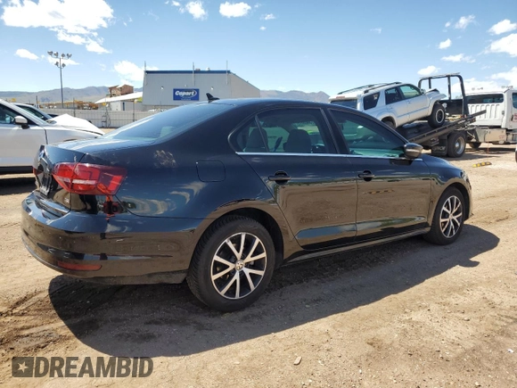 2017 Volkswagen Jetta SE with VIN 3VWDB7AJ4HM204110, listed as a Copart auction lot 57890655 with 82,817 mi miles and Salvage title. Bid and sale history available at DreamBid. Image 3.