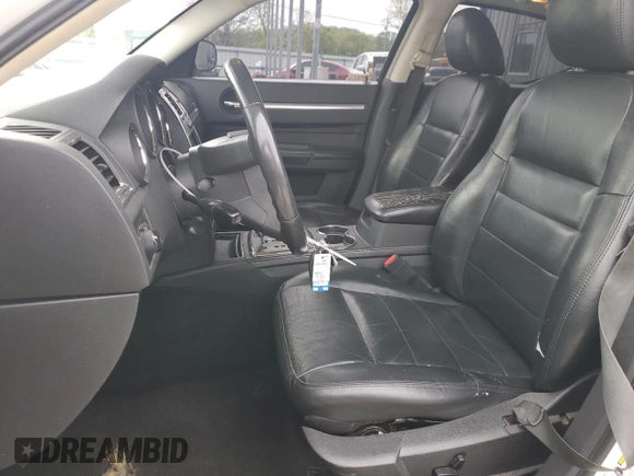 2009 Dodge Charger SXT with VIN 2B3KA33V79H576287, listed as a Copart auction lot 53797755 with 184,584 mi miles and Salvage Title. Bid and sale history available at carsss.com. Image 7.