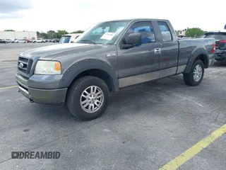 2007 Ford F-150 STX with VIN 1FTRX14W97FB49702, listed as a IAAI auction lot 41566306 with 236,003 mi miles. Bid and sale history available at carsss.com. Image 2.