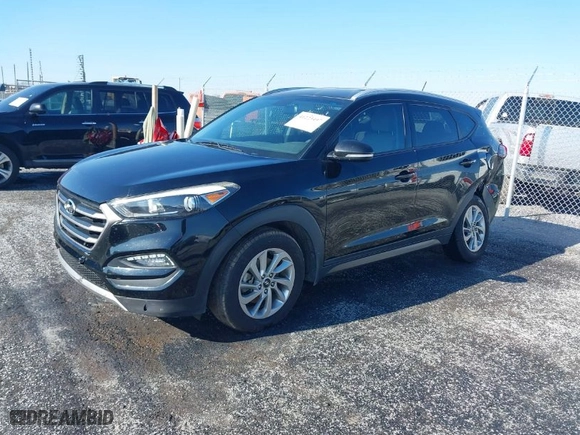 2016 Hyundai Tucson Limited with VIN KM8J33A27GU237225, listed as a IAAI auction lot 41223497 with 158,986 mi miles. Bid and sale history available at carsss.com. Image 2.