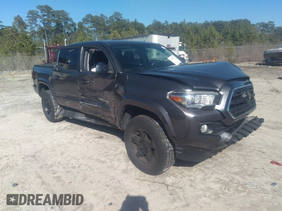 2018 Toyota Tacoma SR5 with VIN 5TFAZ5CN0JX056706, listed as a IAAI auction lot 41774141 with 31,738 mi miles and . Bid and sale history available at DreamBid. Image 1.
